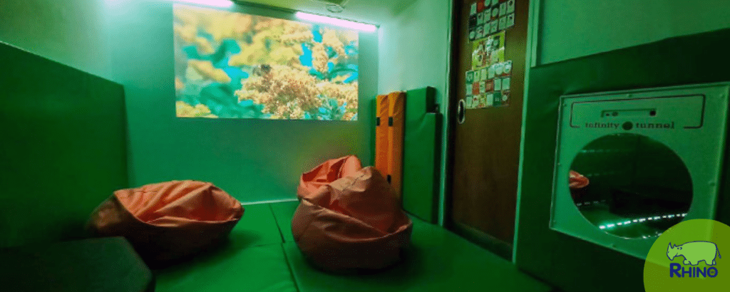 Anti-Ligature sensory room in a mental health environment. With vibrating bumpers, cosy beanbag seating, LED Wall Wash and safety floor and wall padding.