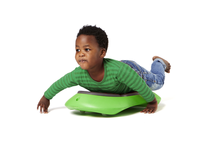 Boy olling along on the Floor Surfer