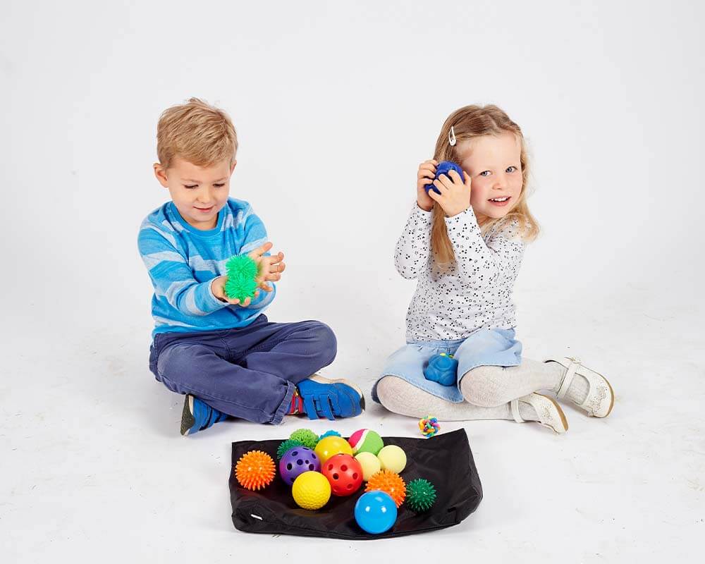 Children exploring their senses with the Sensory Ball Pack