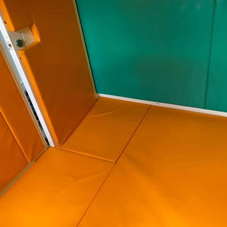 Colourful padding in a de-escalation room