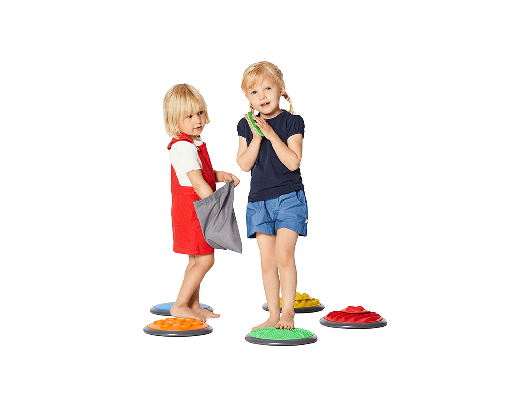 Children exploring their tactile senses with the Tactile Disk Set